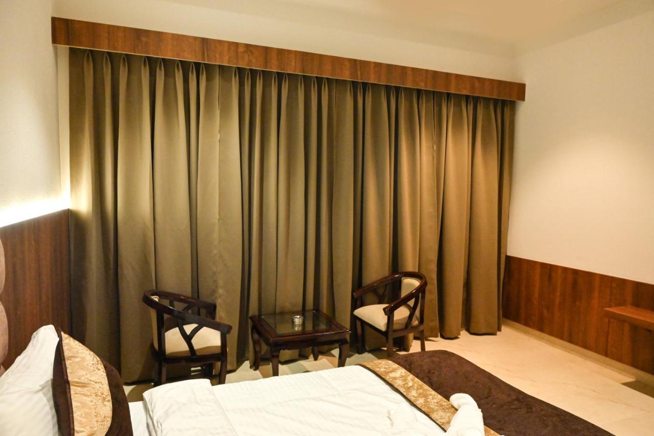 Md Farms And Resorts Matura Exterior foto